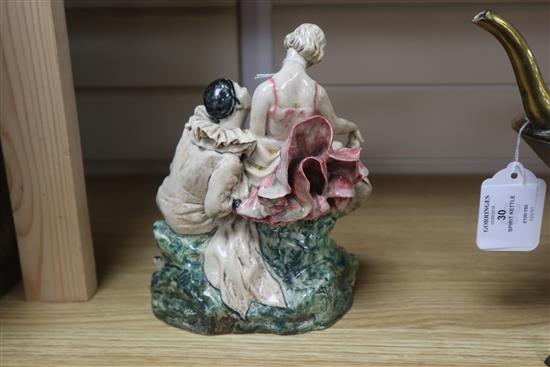 A 1920s/30s art pottery group of Pierrot and Columbine, indistinctly signed to the base, height 19cm